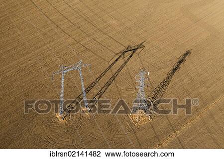 Aerial view, high voltage transmission pylons in the agricultural landscape of Central Valley, Coalinga, California, USA, North America View Large Photo Image Stock Image - Aerial view, high voltage transmission pylons in the agricultural landscape of Central Valley, Coalinga, California, USA, North America. Fotosearch