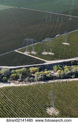 Aerial view, high voltage transmission pylons in the agricultural landscape of Central Valley, Huron, California, USA, North America View Large Photo Image Stock Photography - Aerial view, high voltage transmission pylons in the agricultural landscape of Central Valley, Huron, California, USA, North America. Fotosearch