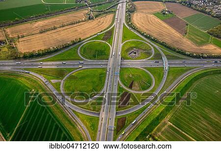 Stock Image - Aerial view, Kamener Kreuz in cloverleaf, motorway junction A1 and motorway A2, Kamen, Ruhr Area, North Rhine-Westphalia, Germany, Europe. Fotosearch