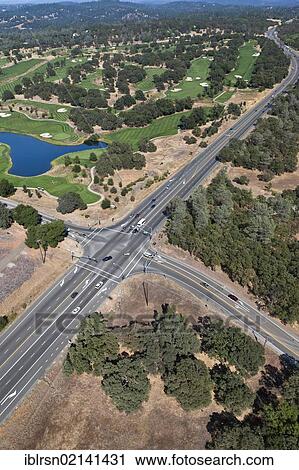 Aerial view of a highway intersection with a golf course, Auburn, California, USA, North America View Large Photo Image Stock Image - Aerial view of a highway intersection with a golf course, Auburn, California, USA, North America. Fotosearch