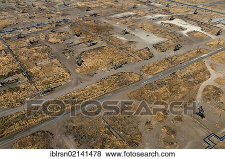 Aerial view, oil field of the Chevron Corporation in Central Valley, Coalinga, California, USA, North America View Large Photo Image Stock Photo - Aerial view, oil field of the Chevron Corporation in Central Valley, Coalinga, California, USA, North America. Fotosearch