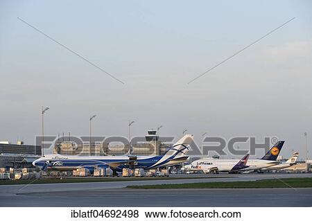 Air Bridge Cargo, Boeing, B747-800, Freighter, Cargo, Freight loading, dusk, Munich Airport, Upper Bavaria, Bavaria, Germany, Europe View Large Photo Image Stock Photo - Air Bridge Cargo, Boeing, B747-800, Freighter, Cargo, Freight loading, dusk, Munich Airport, Upper Bavaria, Bavaria, Germany, Europe. Fotosearch