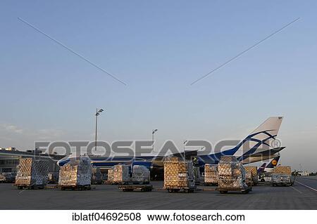 Stock Photo - Air Bridge Cargo, Boeing, B747-800, Freighter, Cargo, Freight loading, dusk, Munich Airport, Upper Bavaria, Bavaria, Germany, Europe. Fotosearch