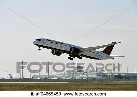 Stock Photo - Air Canada Boeing B787-9, Dreamliner, with landing gear extended after take-off on runway North, Munich Airport, Upper Bavaria, Germany, Europe. Fotosearch