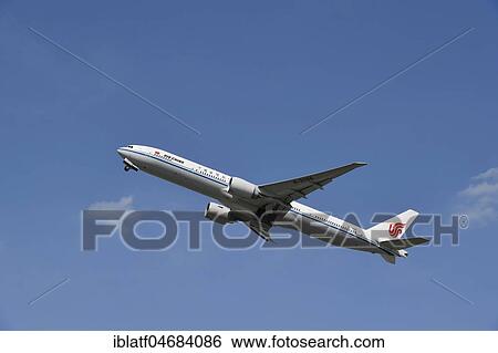 Air China, Boeing, B 777, taking off in front of a blue sky, Munich Airport, Upper Bavaria, Bavaria, Germany, Europe View Large Photo Image Stock Photograph - Air China, Boeing, B 777, taking off in front of a blue sky, Munich Airport, Upper Bavaria, Bavaria, Germany, Europe. Fotosearch