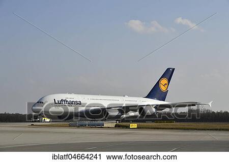 Stock Image - Airbus, A380-800, Lufthansa, with Push Back Truck on taxiway, Munich Airport, Upper Bavaria, Bavaria, Germany, Europe. Fotosearch