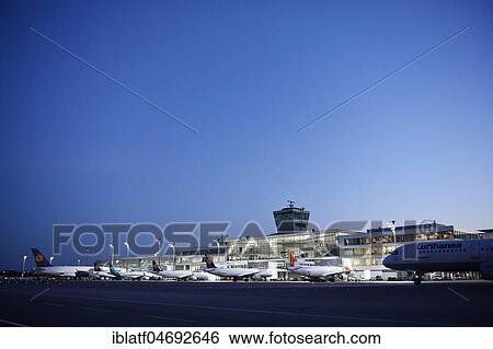 Airlines, line up, terminal 2, at night, Munich airport, Upper Bavaria, Bavaria, Germany, Europe View Large Photo Image Stock Photograph - Airlines, line up, terminal 2, at night, Munich airport, Upper Bavaria, Bavaria, Germany, Europe. Fotosearch