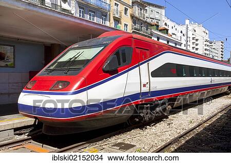 Alfa Pendular, high-speed train of the Portuguese state railway CP, Comboios de Portugal, in Santa Apolonia Railway Station, Lisbon, Portugal, Europe View Large Photo Image Picture - Alfa Pendular, high-speed train of the Portuguese state railway CP, Comboios de Portugal, in Santa Apolonia Railway Station, Lisbon, Portugal, Europe. Fotosearch