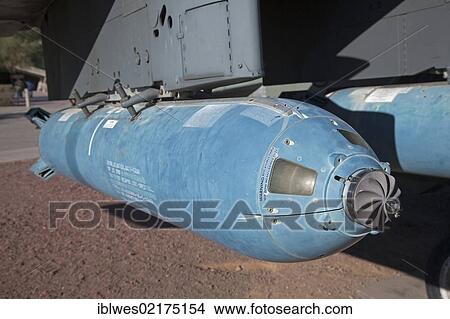 An anti-tank cluster bomb mounted under the wing of a Vought A-7 Corsair II fighter on display at the Pima Air & Space Museum, the museum displays 300 military and civilian aircraft, Tucson, Arizona, USA, North America View Large Photo Image Picture - An anti-tank cluster bomb mounted under the wing of a Vought A-7 Corsair II fighter on display at the Pima Air & Space Museum, the museum displays 300 military and civilian aircraft, Tucson, Arizona, USA, North America. Fotosearch