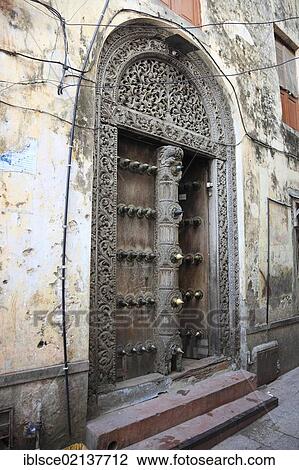 Ancient Arabic door in the historic town centre of Stone Town, Zanzibar, Tanzania, Africa View Large Photo Image Stock Image - Ancient Arabic door in the historic town centre of Stone Town, Zanzibar, Tanzania, Africa. Fotosearch