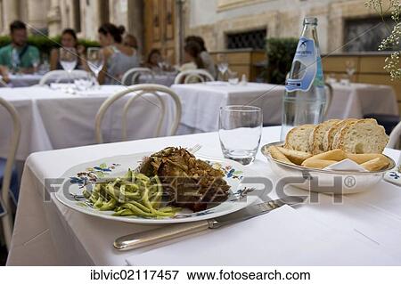 Stock Photo - Antipasti with zucchini and artichoke in a Roman gourmet restaurant, Rome, Italy, Europe. Fotosearch