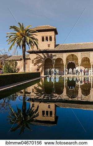 Antique Building El Partal with pool and palm trees, Alhambra, city castle on Sabikah Hill, Grenada, Andalusia, Spain, Central America View Large Photo Image Stock Photograph - Antique Building El Partal with pool and palm trees, Alhambra, city castle on Sabikah Hill, Grenada, Andalusia, Spain, Central America. Fotosearch