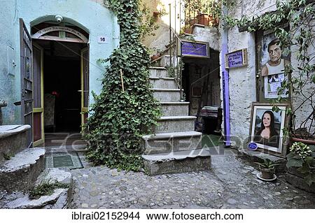 Artist's studio in a narrow lane with stairways and passages, medieval town of Vecchia Calcata, valley of Valle del Treja, Lazio, Italy, Europe View Large Photo Image Picture - Artist's studio in a narrow lane with stairways and passages, medieval town of Vecchia Calcata, valley of Valle del Treja, Lazio, Italy, Europe. Fotosearch