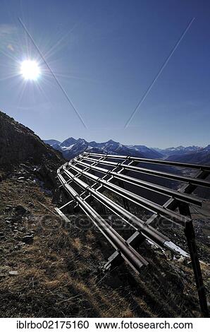 Avalanche control or barrier, Munt Baselgia, Zernez, Lower Engadine, Engadine, Grisons, Switzerland, Europe View Large Photo Image Stock Image - Avalanche control or barrier, Munt Baselgia, Zernez, Lower Engadine, Engadine, Grisons, Switzerland, Europe. Fotosearch
