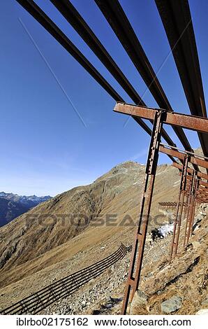 Avalanche control or barrier, Munt Baselgia, Zernez, Lower Engadine, Engadine, Grisons, Switzerland, Europe View Large Photo Image Stock Image - Avalanche control or barrier, Munt Baselgia, Zernez, Lower Engadine, Engadine, Grisons, Switzerland, Europe. Fotosearch