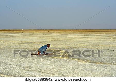 Believer Muslim praying in the desert, Assale salt lake near Hamadela, Danakil depression, Afar region, Ethiopia, Africa View Large Photo Image Stock Image - Believer Muslim praying in the desert, Assale salt lake near Hamadela, Danakil depression, Afar region, Ethiopia, Africa. Fotosearch