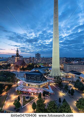 Berlin Alexanderplatz with St. Mary's Church in the evening, Berlin, Germany, Europe View Large Photo Image Stock Photograph - Berlin Alexanderplatz with St. Mary's Church in the evening, Berlin, Germany, Europe. Fotosearch