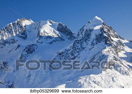 Stock Photo - Biancograt with Piz Bernina, 4049 m, Piz Scerscen, 3971 m, Piz Roseg, 3937 m, view from Piz Corvatsch, Graubuenden, Switzerland, Europe. Fotosearch