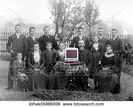 Big family, group shot with one of the first Macs, montage, original picture about 1920, Germany, Europe View Large Photo Image Stock Photo - Big family, group shot with one of the first Macs, montage, original picture about 1920, Germany, Europe. Fotosearch