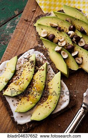 Black bread with curd cheese, avocado and nuts, food still-life, studio shot View Large Photo Image Stock Image - Black bread with curd cheese, avocado and nuts, food still-life, studio shot. Fotosearch