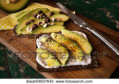 Black bread with curd cheese, avocado and nuts, food still-life, studio shot View Large Photo Image Stock Photography - Black bread with curd cheese, avocado and nuts, food still-life, studio shot. Fotosearch