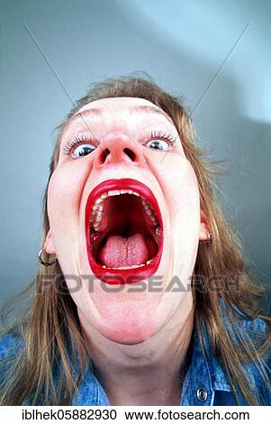 Stock Image - Blonde woman screams, Berlin, Germany, Europe. Fotosearch