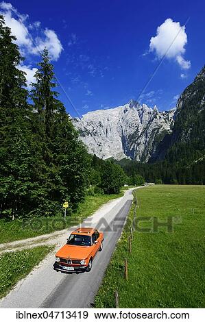 Stock Photo - BMW 2002 tii, classic car on the Rossfeld panorama road, Berchtesgaden, Upper Bavaria, Bavaria, Germany, Europe. Fotosearch