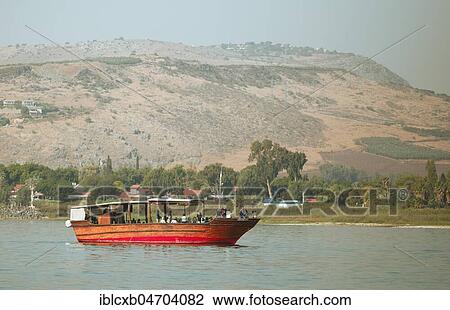 Boat for tourists on Lake Tiberias, Galilee, Israel, Asia View Large Photo Image Stock Image - Boat for tourists on Lake Tiberias, Galilee, Israel, Asia. Fotosearch
