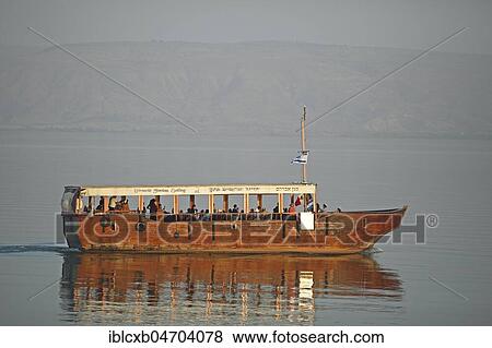 Boat for tourists on Lake Tiberias, Galilee, Israel, Asia View Large Photo Image Stock Photo - Boat for tourists on Lake Tiberias, Galilee, Israel, Asia. Fotosearch
