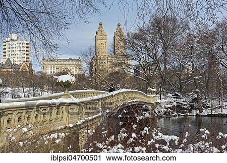 Bow Bridge with San Remo building in Central Park, New York City, USA, North America View Large Photo Image Stock Image - Bow Bridge with San Remo building in Central Park, New York City, USA, North America. Fotosearch