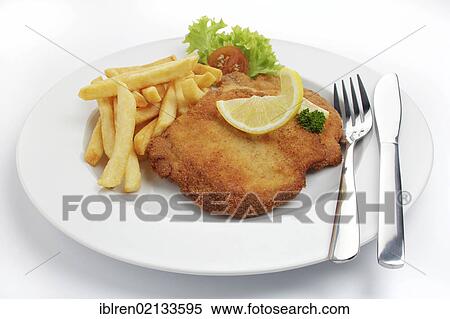 Breaded pork escalope Viennese style with lemon slice and French fries View Large Photo Image Stock Photography - Breaded pork escalope Viennese style with lemon slice and French fries. Fotosearch