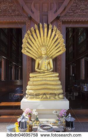 Stock Photo - Buddha statue at Teak wood temple Wat Ao Noi, Prachuap Khiri Khan, Thailand, Asia. Fotosearch
