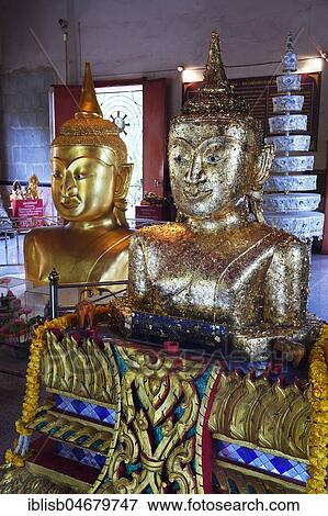 Stock Photo - Buddha statues in the temple Wat Phra Thong, Phuket, Thailand, Asia. Fotosearch