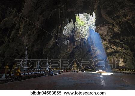 Stock Photography - Buddha statues inside the buddhist temple cave, Khao Luang caves, Phetchaburi, Thailand, Asia. Fotosearch