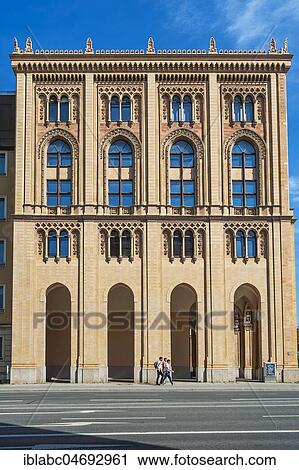 Building of the government of Upper Bavaria, west facade, terracotta façade in neo-Gothic, so-called Maximilian style, Old Town, Lehel, Munich, Upper Bavaria, Bavaria, Germany, Europe View Large Photo Image Stock Image - Building of the government of Upper Bavaria, west facade, terracotta façade in neo-Gothic, so-called Maximilian style, Old Town, Lehel, Munich, Upper Bavaria, Bavaria, Germany, Europe. Fotosearch
