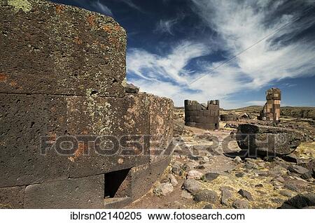 Stock Photography - Burial towers called chullpas, of the Aymara people from the Colla culture above Lake Umayo near Puno, conquered by the Incas in the 15th Century and reused, Puno, Peru, South America. Fotosearch