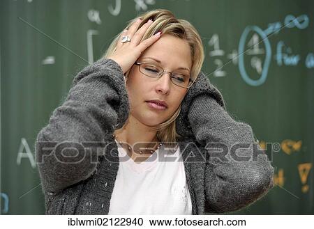 Burnout, trainee teacher, prospective teacher, young teacher, exhausted, desperate, mathematics, blackboard, classroom, Baden-Wuerttemberg, Germany, Europe View Large Photo Image Stock Image - Burnout, trainee teacher, prospective teacher, young teacher, exhausted, desperate, mathematics, blackboard, classroom, Baden-Wuerttemberg, Germany, Europe. Fotosearch