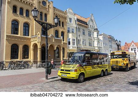 Stock Image - Buses, City Tour, Marketplace, Wismar, Mecklenburg-Western Pomerania, Germany, Europe. Fotosearch