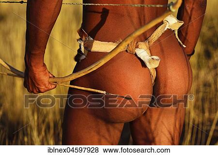 Stock Photo - Bushman of the San people hunting,! Xaus Lodge, Kalahari or Kglagadi Transfrontier Park, Northern Cape, South Africa, Africa. Fotosearch