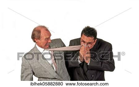 Businessman uses someone else's tie as a handkerchief, rude, disgusting, funny, Berlin, Germany, Europe View Large Photo Image Stock Image - Businessman uses someone else's tie as a handkerchief, rude, disgusting, funny, Berlin, Germany, Europe. Fotosearch