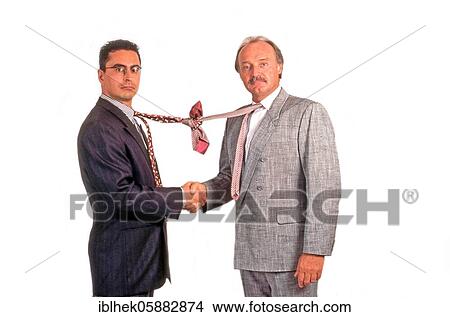 Picture - Businessmen shake hands, funny, tie knotted, Berlin, Germany, Europe. Fotosearch