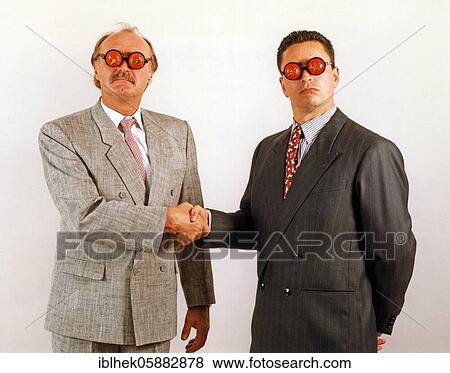 Businessmen with tomatoes on their eyes, funny, blind, Berlin, Germany, Europe View Large Photo Image Stock Photo - Businessmen with tomatoes on their eyes, funny, blind, Berlin, Germany, Europe. Fotosearch