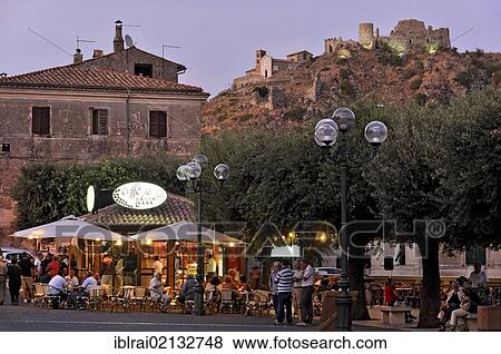 Café, bar in Piazza Vittorio Veneto, Chiesa Madonna della Rocca church at Castello dei Frangipane, Frangipani castle, Rocca di Tolfa at back, Tolfa, Lazio, Italy, Europe View Large Photo Image Stock Photo - Café, bar in Piazza Vittorio Veneto, Chiesa Madonna della Rocca church at Castello dei Frangipane, Frangipani castle, Rocca di Tolfa at back, Tolfa, Lazio, Italy, Europe. Fotosearch