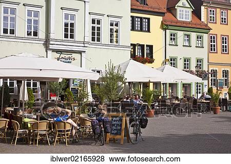 Cafés and restaurants in Wenigemarkt square, old town of Erfurt, Thuringia, Germany, Europe View Large Photo Image Stock Photo - Cafés and restaurants in Wenigemarkt square, old town of Erfurt, Thuringia, Germany, Europe. Fotosearch