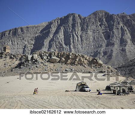 Camping in the coastal area of Bukha in the Arabian Gulf, in the Omani enclave of Musandam, Oman, Middle East, Asia View Large Photo Image Stock Image - Camping in the coastal area of Bukha in the Arabian Gulf, in the Omani enclave of Musandam, Oman, Middle East, Asia. Fotosearch