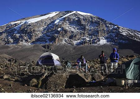 Campsite with a view to the summit of Mount Kilimanjaro, as seen from the Barranco Hut, Tanzania, Africa View Large Photo Image Picture - Campsite with a view to the summit of Mount Kilimanjaro, as seen from the Barranco Hut, Tanzania, Africa. Fotosearch
