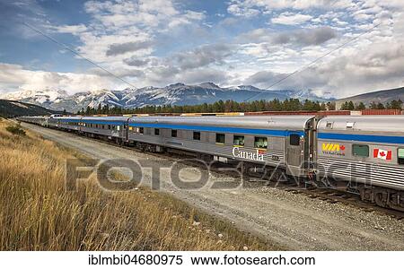 Stock Photography - Canadian Railway in front of Rocky Mountains, Jasper National Park, City of Jasper, Alberta, Canada, North America. Fotosearch