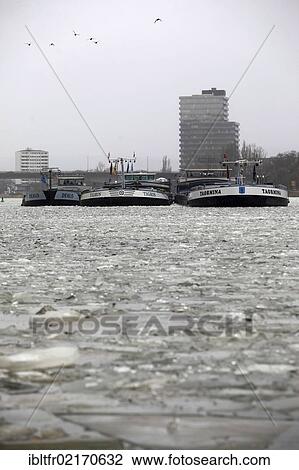 Cargo ships are stuck in the ice on the Moselle river at Guels, Koblenz, Rhineland-Palatinate, Germany, Europe View Large Photo Image Stock Image - Cargo ships are stuck in the ice on the Moselle river at Guels, Koblenz, Rhineland-Palatinate, Germany, Europe. Fotosearch