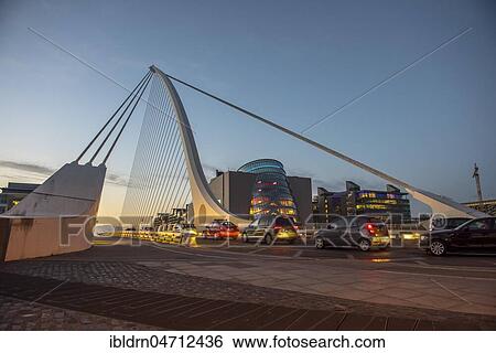 Cars on Samuel Beckett Bridge, cable-stayed bridge and swing bridge over the river Liffey, architect Santiago Calatrava, Dublin, Republic of Ireland View Large Photo Image Stock Photograph - Cars on Samuel Beckett Bridge, cable-stayed bridge and swing bridge over the river Liffey, architect Santiago Calatrava, Dublin, Republic of Ireland. Fotosearch