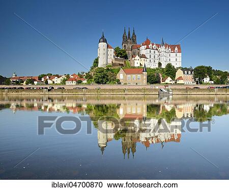 Stock Image - Castle hill with Cathedral and Albrechtsburg Castle is reflected in the river Elbe, Meissen, Saxony, Germany, Europe. Fotosearch